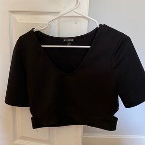 Express size medium crop top with small key holes on both sides.